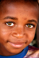Cameroonian boy with green eyes