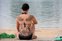 Tattoo girl on the beach