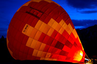 Hot air balloon being filled at sunrise